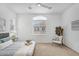 Comfortable bedroom featuring a large window offering plenty of natural light and a calming decor at 1727 E Chelsea Ln, Gilbert, AZ 85295