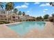 Sparkling community pool with lounge chairs, palm trees, and a charming gazebo in a resort-like setting at 1727 E Chelsea Ln, Gilbert, AZ 85295