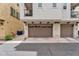 Street view of townhouses with two-car garages at 1727 E Chelsea Ln, Gilbert, AZ 85295