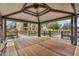 Interior of a charming gazebo with beautiful wood floors and views of the surrounding community at 1727 E Chelsea Ln, Gilbert, AZ 85295
