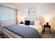 Serene bedroom with neutral tones, a plush bed, and contemporary décor, providing a relaxing retreat at 1831 E Cornell Dr, Tempe, AZ 85283