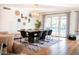 Elegant dining room with modern lighting and stylish decor, perfect for hosting gatherings and enjoying meals at 1831 E Cornell Dr, Tempe, AZ 85283