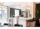 Contemporary kitchen with stainless steel appliances, bright countertops, and island seating, ideal for cooking at 1831 E Cornell Dr, Tempe, AZ 85283