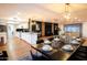 Open-concept living space seamlessly connects the kitchen and living areas, perfect for modern living and entertaining at 1831 E Cornell Dr, Tempe, AZ 85283
