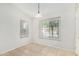 Cozy dining area with tile flooring, natural light and large window at 2191 W Goldmine Mountain Dr, Queen Creek, AZ 85144