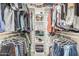 Walk-in closet with ample storage, shelving, and clothing racks at 22056 N 32Nd Ave, Phoenix, AZ 85027