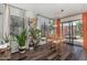 Dining area with sliding glass doors to the backyard and modern decor at 22056 N 32Nd Ave, Phoenix, AZ 85027