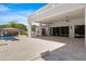 Expansive outdoor patio with covered seating, perfect for year-round enjoyment and entertaining friends at 24434 S 201St Ct, Queen Creek, AZ 85142