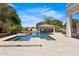 Incredible pool and jacuzzi with a nearby outdoor pavilion, creating an oasis for relaxation and enjoyment at 24434 S 201St Ct, Queen Creek, AZ 85142