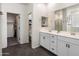 Bathroom with double sinks, quartz counters and tile flooring at 25119 N 134Th Dr, Peoria, AZ 85383