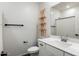 Bright bathroom featuring white vanity, modern fixtures, and decorative macrame at 25119 N 134Th Dr, Peoria, AZ 85383