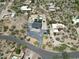 Expansive aerial view of property showcasing desert landscaping, pool, and manicured grounds at 26626 N 70Th Pl, Scottsdale, AZ 85266