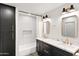 Elegant bathroom featuring double sinks, marble countertops, and modern fixtures, creating a luxurious spa-like retreat at 26626 N 70Th Pl, Scottsdale, AZ 85266