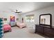 Spacious bedroom with two twin beds, window view, and stylish decor, creating a comforting and functional space at 26626 N 70Th Pl, Scottsdale, AZ 85266