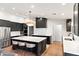 Well-equipped kitchen with stainless steel appliances, spacious island, and contemporary finishes at 26626 N 70Th Pl, Scottsdale, AZ 85266