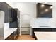 Modern kitchen with sleek cabinetry, a spacious island, and high-end appliances at 26626 N 70Th Pl, Scottsdale, AZ 85266