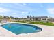 Beautiful pool area featuring a pool, artificial turf, and a backyard that's perfect for entertaining at 26626 N 70Th Pl, Scottsdale, AZ 85266