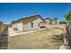 Exterior backyard featuring covered patio and desert landscaping at 2853 E Cathy Dr, Gilbert, AZ 85296