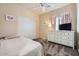Cozy bedroom featuring a neutral color scheme and built-in wardrobe storage at 2853 E Cathy Dr, Gilbert, AZ 85296