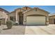 Charming single-Gathering home with a well-maintained yard, two car garage, and welcoming entrance at 2853 E Cathy Dr, Gilbert, AZ 85296