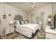 Serene bedroom featuring a comfortable bed with decorative pillows and charming accents at 3098 E Stottler Dr, Gilbert, AZ 85296