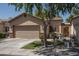 Charming single-story home featuring a well-manicured lawn and attached two-car garage at 3098 E Stottler Dr, Gilbert, AZ 85296