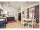 Charming kitchen featuring white upper cabinets and navy lower cabinets for a modern touch at 3098 E Stottler Dr, Gilbert, AZ 85296
