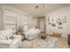 Bright living room featuring a ceiling fan, tile floors, and neutral decor for a cozy feel at 3098 E Stottler Dr, Gilbert, AZ 85296