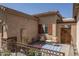 Cozy patio with a charming blue and white rug and comfortable seating for relaxing outdoors at 3098 E Stottler Dr, Gilbert, AZ 85296