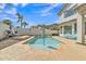 Inviting backyard with a refreshing pool, lounge area, and lush greenery offering a private outdoor retreat at 3139 E Runaway Bay Pl, Chandler, AZ 85249