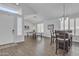 Spacious game room with a ping pong table, bar seating, and ample natural light through plantation shutters at 3139 E Runaway Bay Pl, Chandler, AZ 85249