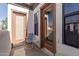 A cozy balcony featuring a chair and views, with a chair and a door at 3150 E Beardsley Rd # 1023, Phoenix, AZ 85050