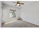 A well-lit bedroom is equipped with a ceiling fan and a cozy window at 3150 E Beardsley Rd # 1023, Phoenix, AZ 85050