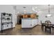 Open kitchen and dining area with sleek appliances and modern decor at 3150 E Beardsley Rd # 1023, Phoenix, AZ 85050