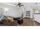 Cozy living room with plush seating, tile flooring, and natural light at 3150 E Beardsley Rd # 1023, Phoenix, AZ 85050
