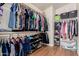 Walk-in closet featuring shoe racks, clothing rods, and organizational storage at 3301 S Goldfield Rd # 6050, Apache Junction, AZ 85119