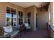 Cozy front porch with seating area perfect for relaxing outdoors at 3301 S Goldfield Rd # 6050, Apache Junction, AZ 85119