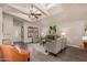 Open living room features skylights, ceiling fan and comfortable seating arrangement at 3301 S Goldfield Rd # 6050, Apache Junction, AZ 85119