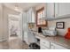 Charming office featuring built in cabinets, desk, and adjacent bathroom at 3301 S Goldfield Rd # 6050, Apache Junction, AZ 85119