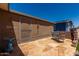 Outdoor patio featuring a decorative bird bath and a lounge chair for peaceful relaxation in the sun at 3301 S Goldfield Rd # 6050, Apache Junction, AZ 85119
