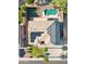Top-down aerial view showcasing a refreshing backyard pool, patio and lush landscaping at 3574 E Latham Way, Gilbert, AZ 85297