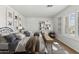 Charming ' bedroom with two beds, playful decor, and ample natural light, creating a cozy atmosphere at 3574 E Latham Way, Gilbert, AZ 85297