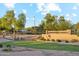 Welcome to Coronado Ranch, a well-maintained community with lush landscaping and inviting entrance features at 3574 E Latham Way, Gilbert, AZ 85297