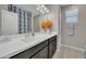 Bright bathroom vanity with ample counterspace and storage with modern sink fixtures at 38150 W San Sisto Ave, Maricopa, AZ 85138