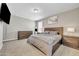 Warm bedroom with plush carpeting, natural light, and coordinated furniture set at 38150 W San Sisto Ave, Maricopa, AZ 85138