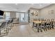 Bright living area featuring neutral color palette and sliding door access to backyard at 38150 W San Sisto Ave, Maricopa, AZ 85138