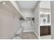 Spacious walk-in closet with shelving and hanging space, offering ample storage at 38150 W San Sisto Ave, Maricopa, AZ 85138