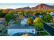 Gorgeous aerial view of a suburban landscape showcasing lush trees and a charming residential area at 3824 N 50Th Pl, Phoenix, AZ 85018