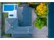 Aerial view of a home featuring a backyard pool, patio dining area, and beautiful landscaping at 3824 N 50Th Pl, Phoenix, AZ 85018