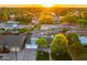 Picturesque aerial view of a well-maintained home with a lush yard and a refreshing pool at 3824 N 50Th Pl, Phoenix, AZ 85018